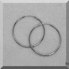 J02. 14K gold hoops. - $110